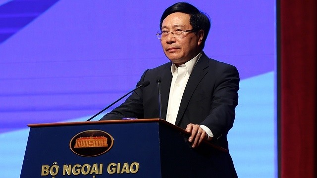 Deputy Prime Minister and Foreign Minister Pham Binh Minh speaks at the event. (Photo: VGP)