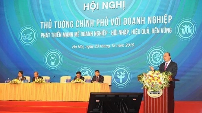 Prime Minister Nguyen Xuan Phuc delivers his opening speech at the dialogue. (Photo: NDO/Tran Hai)