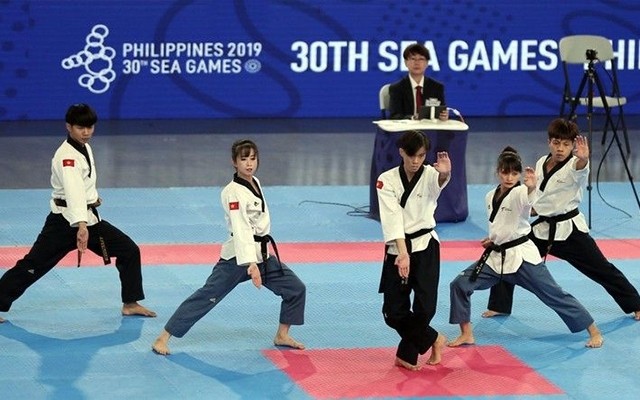 Vietnamese taekwondo team won the gold medal in the team's performance event at the 30th SEA Games. 