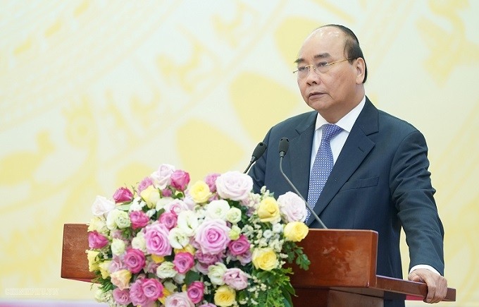 PM Nguyen Xuan Phuc speaks at the conference. (Photo: thanhtra.com.vn)