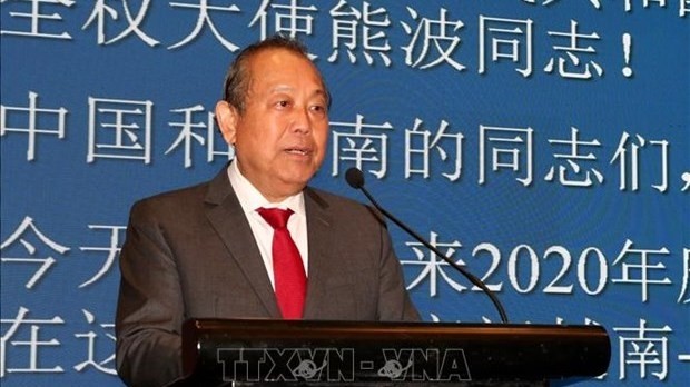 Deputy Prime Minister Truong Hoa Binh speaks at the banquet. (Photo: VNA)