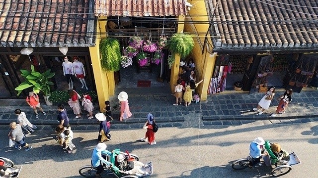 Visitors at Hoi An Ancient Town in Quang Nam Province. (Photo: NDO/Thanh Tung)