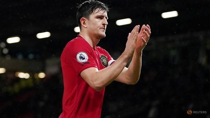 FILE PHOTO: Soccer Football - Premier League - Manchester United v Norwich City - Old Trafford, Manchester, Britain - January 11, 2020 Manchester United's Harry Maguire applauds fans after the match. (Reuters)