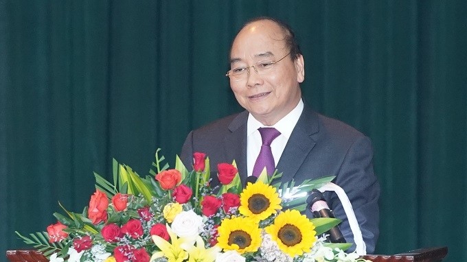 PM Nguyen Xuan Phuc speaks at the working session. (Photo: VGP)