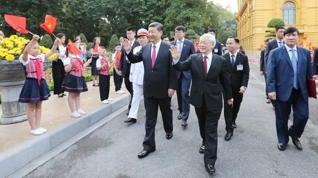 Party General Secretary and State President Nguyen Phu Trong and his Chinese counterpart Xi Jinping at the visit to Vietnam in November 2017. (Photo: VNA)