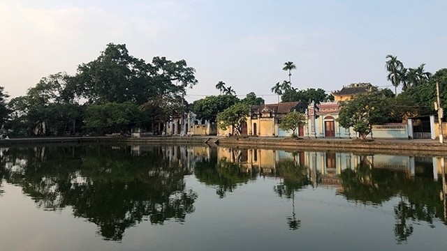 Nom Village features ancient houses which remain along a beautiful peaceful pond.