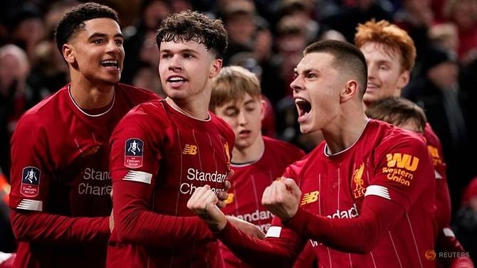 Soccer Football - FA Cup Fourth Round Replay - Liverpool v Shrewsbury Town - Anfield, Liverpool, Britain - February 4, 2020 Liverpool's Neco Williams celebrates with team mates after Shrewsbury Town's Ro-Shaun Williams scored an own goal and the first for Liverpool. (Photo: Reuters)