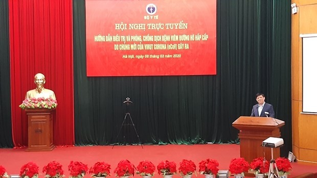 Deputy Minister of Health Nguyen Thanh Long speaking at the online conference in Hanoi. (Photo: moh.gov.vn)
