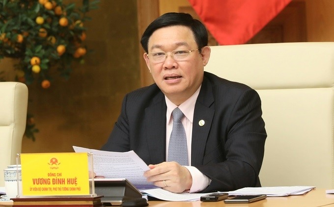 Deputy PM Vuong Dinh Hue speaks at the meeting. (Photo: VGP)