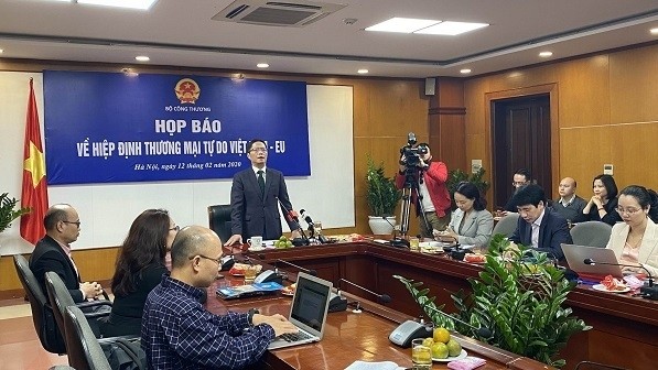Minister of Industry and Trade Tran Tuan Anh speaks at a press conference in Hanoi on February 12 after the EP's ratification of EVFTA earlier on the same day. (Photo: VGP)