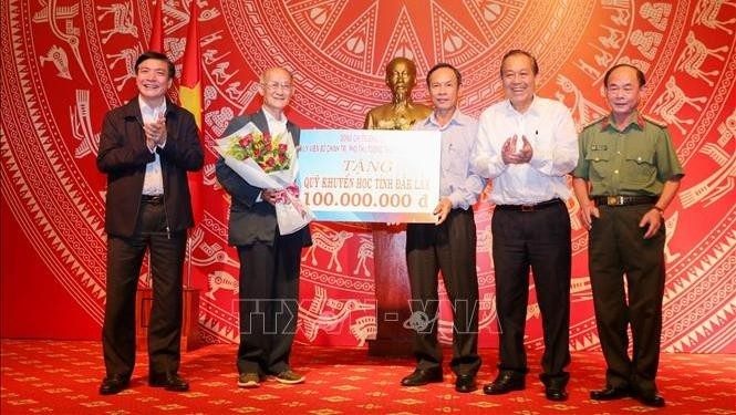 Deputy Prime Minister Truong Hoa Binh (second from right) at the event (Photo: VNA)