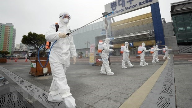 Quarantine officials carry out a disinfection operation in Daegu  (Photo: Yonhap)