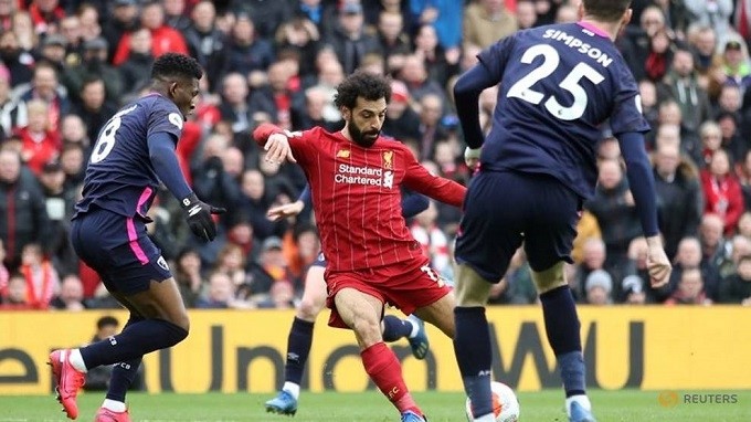 Soccer Football - Premier League - Liverpool v AFC Bournemouth - Anfield, Liverpool, Britain - March 7, 2020 Liverpool's Mohamed Salah scores their first goal. (Reuters)