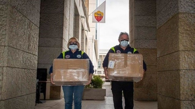 Italian football club AS Roma delivered 8,000 pairs of protective gloves and 2,000 bottles of hand sanitiser to churches around the capital, where they will be redistributed to those most in need. (Photo: AS Roma)