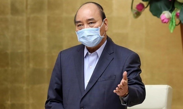 Prime Minister Nguyen Xuan Phuc speaks at the meeting (Photo: VNA)