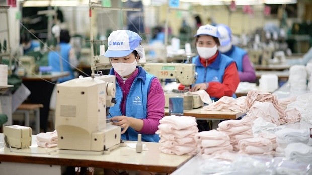 Vietnamese businesses are able to produce around 200 million face masks a month (Photo: Vinatex).