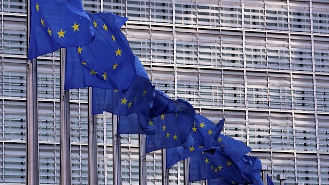 European Union flags fly outside the European Commission headquarters in Brussels. (Photo: Reuters)