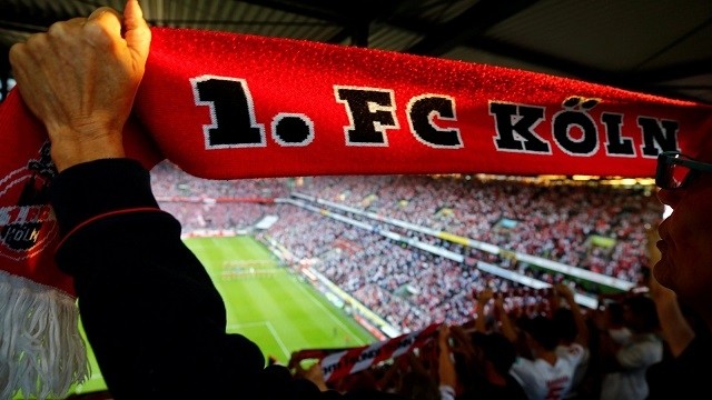 An FC Cologne fan displays her fan scarf at RheinEnergie stadium, in Cologne, Germany. (Photo: Reuters)