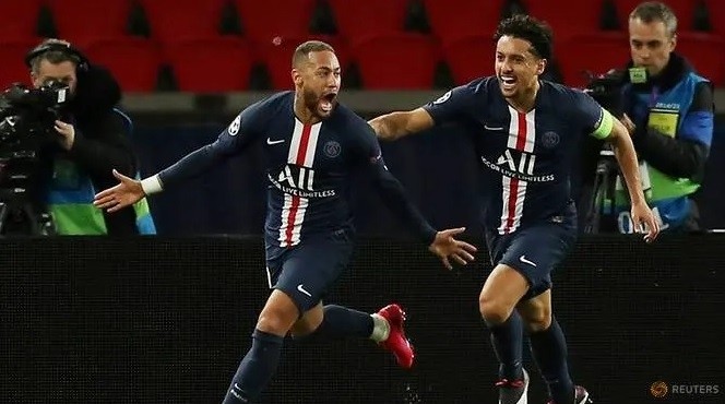 File photo of Paris St Germain's Neymar (left) celebrating scoring their first goal against Borussia Dortmund in the Champions League Round of 16 second leg on Mar 11, 2020. (UEFA Pool/Handout via Reuters)