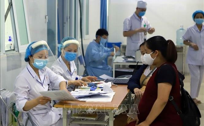 Photo contest praises Vietnamese nurses’ contributions to COVID-19 fight (Photo: VNA)