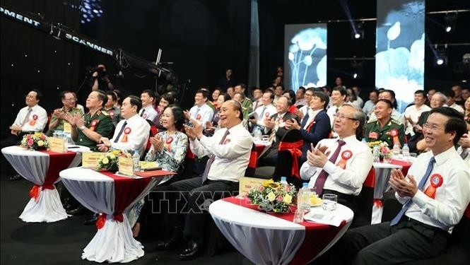 Delegates enjoy performances at the event (Photo: VNA)