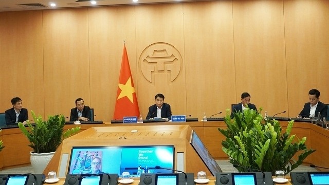 Hanoi leaders at a teleconference discussing COVID-19 in global cities held on June 2, 2020. (Photo: NDO/Giang Nam)