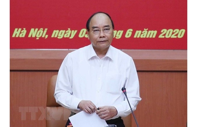 Prime Minister Nguyen Xuan Phuc speaks at the meeting. (Photo: VNA)