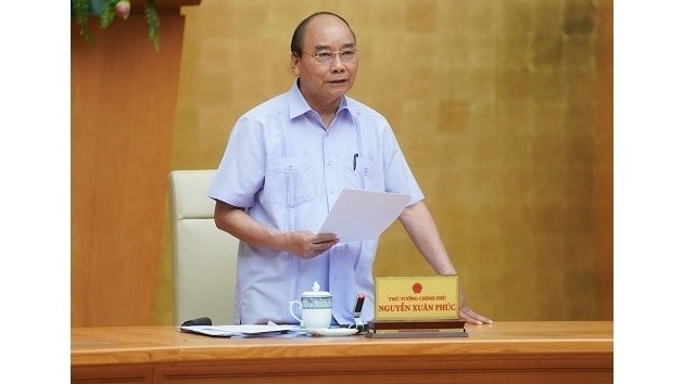Prime Minister Nguyen Xuan Phuc speaks at a meeting with his cabinet members in Hanoi on June 9, 2020. (Photo: VGP)