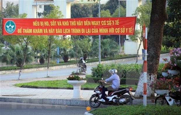 A banner on a street in Vinh Phuc province to mobilise people stay safe amid the COVID-19 pandemic (Photo: VNA)