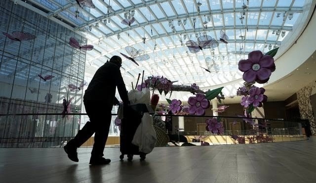A cleaner walks toward the atrium of MGM National Harbor as the complex opened its doors to guests after an easing of restrictions to control the spread of the coronavirus disease (COVID-19) in Oxon Hill, Maryland, U.S., June 29, 2020. (Photo: Reuters)