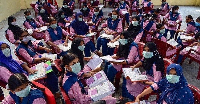 (Illustrative Image). Students at a school in Hyderabad, India. On July 5, the health ministry reported a record single-day spike of 24,850 new cases and more than 600 deaths, pushing the overall case tally to 673,165, closing in on Russia, the third-most affected country globally. (Photo: PTI)