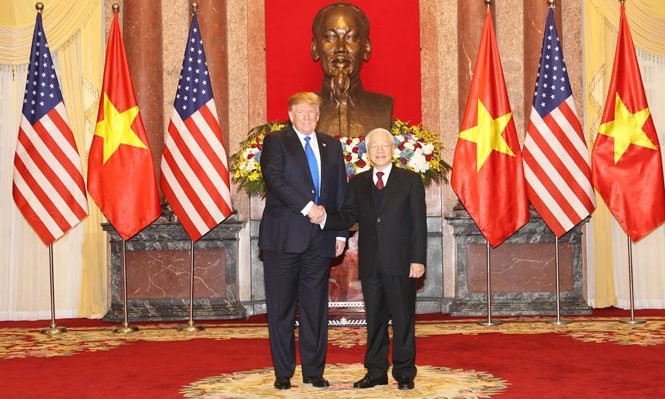 Party General Secretary and State President Nguyen Phu Trong (R) hosts a reception for US President Donald Trump in February 2019 (Photo: VNA)