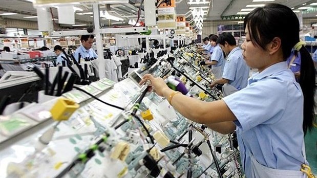 US businesses have expressed their intention to expand their investment and business activities in Vietnam. (Photo: VNA)