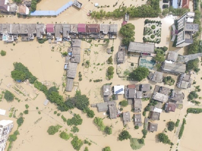 Aerial photo taken on July 13, 2020 shows the flooded village in Sanjiao Township in Yongxiu County, east China's Jiangxi Province. (Photo: Xinhua)