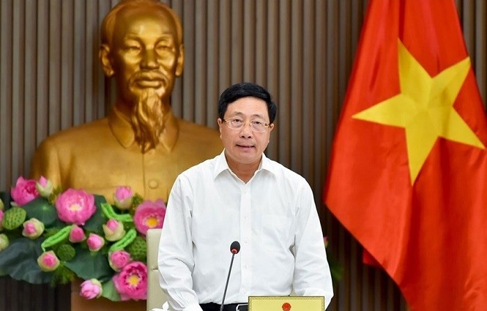 Deputy Prime Minister and Foreign Minister Pham Binh Minh speaks at the meeting. (Photo: laodong.vn)