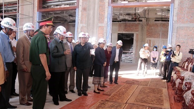 Lao leaders pleased with progress, quality of Vietnamese-built NA building (Photo: VNA)