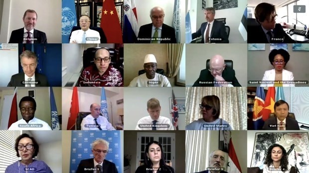 Participants at the online meeting discussing the situation in Syria (Photo: VNA)