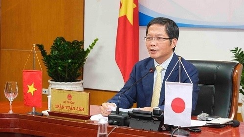 Minister of Industry and Trade Tran Tuan Anh at the virtual meeting (Photo: MOIT)