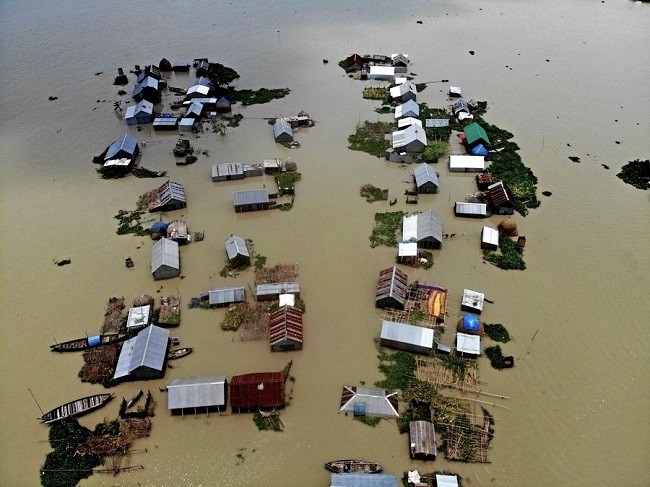 Aerial photo shows flood-affected houses in Faridpur, Bangladesh, July 19, 2020. (Photo: Xinhua)