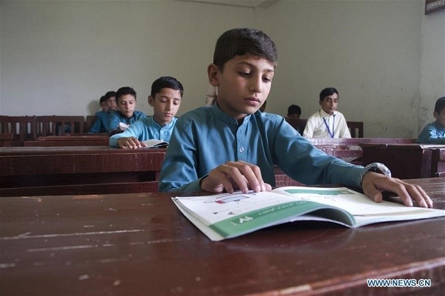 Afghan students attend a class in Asadabad, capital of Kunar province, eastern Afghanistan, Aug. 22, 2020. The Afghan government reopened schools on Saturday after a five-month shutdown due to the impact of COVID-19 pandemic. (Photo: Xinhua)