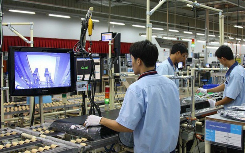 Workers at a factory of Samsung in Vietnam.
