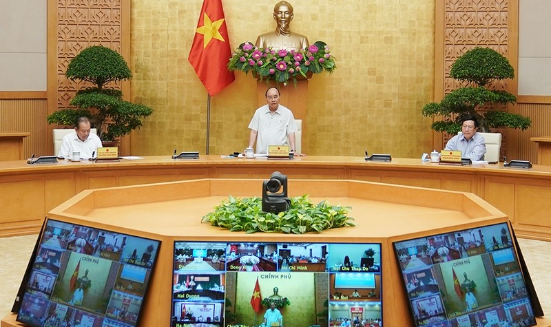 PM Nguyen Xuan Phuc speaking at the meeting (Photo: NDO/TRAN HAI)