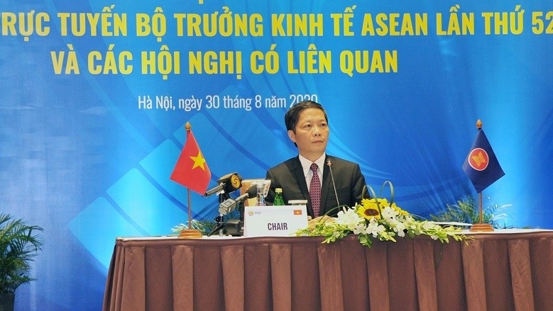 Minister of Industry and Trade Tran Tuan Anh at the press conference