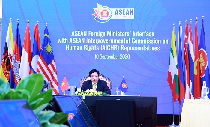 Deputy Prime Minister and Foreign Minister Pham Binh Minh chairs the event. (Photo: VGP)
