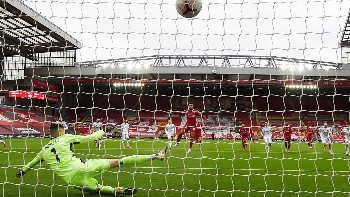 Soccer Football - Premier League - Liverpool v Leeds United - Anfield, Liverpool, Britain - September 12, 2020 Liverpool's Mohamed Salah scores their first goal from the penalty spot. (Photo: Pool via Reuters)