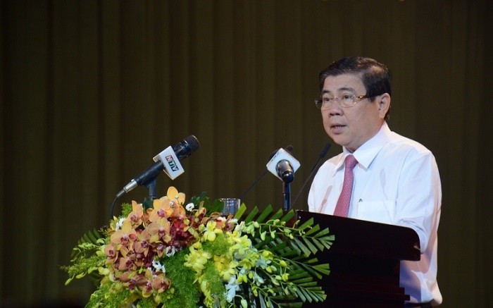 Chairman of the HCM City People’s Committee Nguyen Thanh Phong delivers a speech at the get-together.
