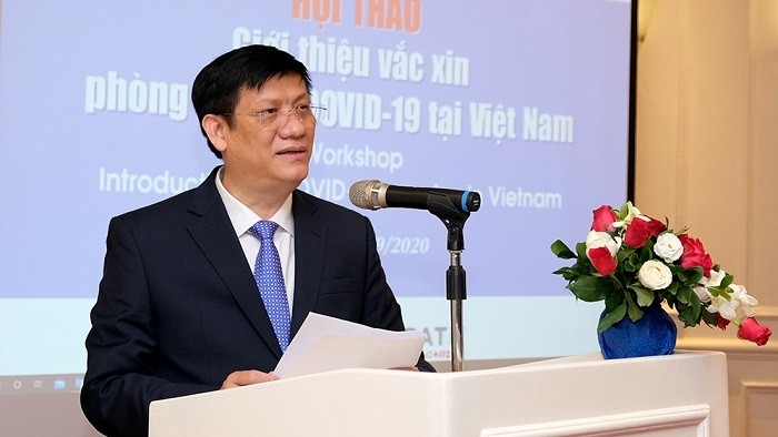 Acting Minister of Health Nguyen Thanh Long speaks at the seminar. (Photo: Ministry of Health)
