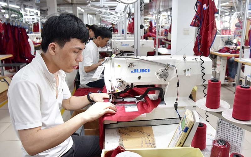 Making clothes for export at the Nam Tiep Joint Stock Company, An Xa industrial cluster, Nam Dinh city, Nam Dinh province. Photo: Nam Anh