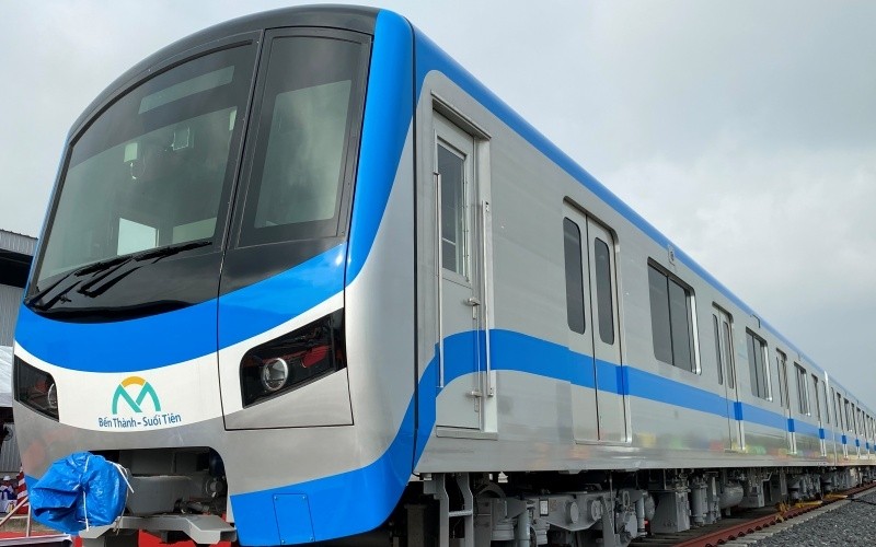 The blue and white three-car train is designed to assist people with disabilities. 