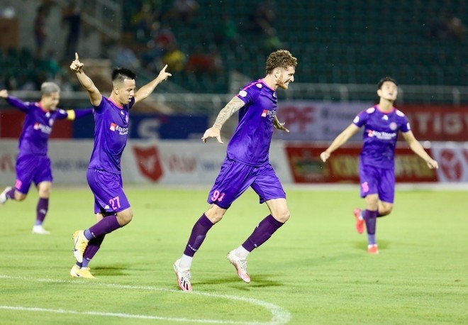 Saigon FC players celebrate scoring a goal during their match against Hong Linh Ha Tinh.